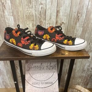 Stylish Black Sneakers with Floral Accents